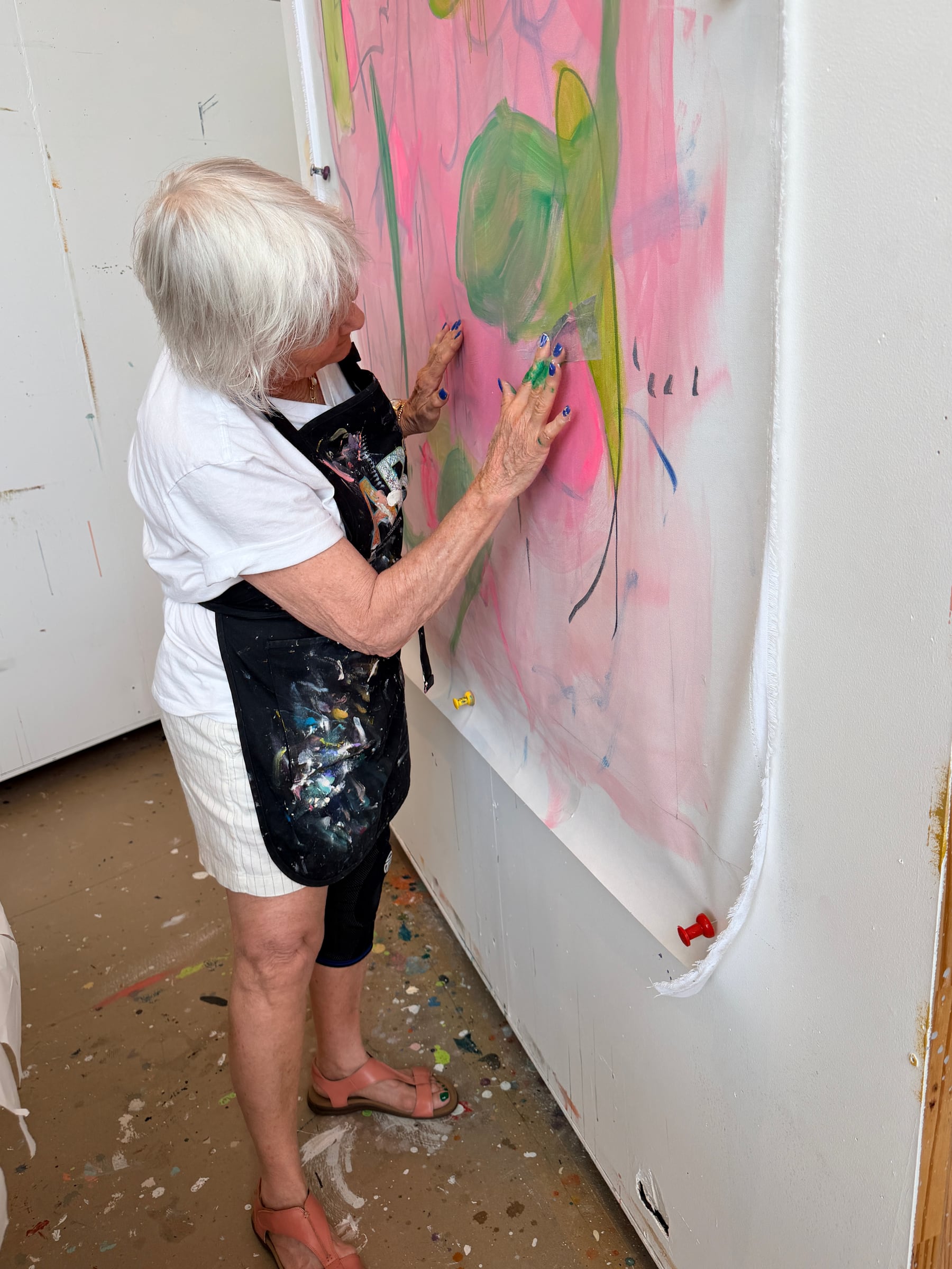 Nancy Junkin working on a large canvas